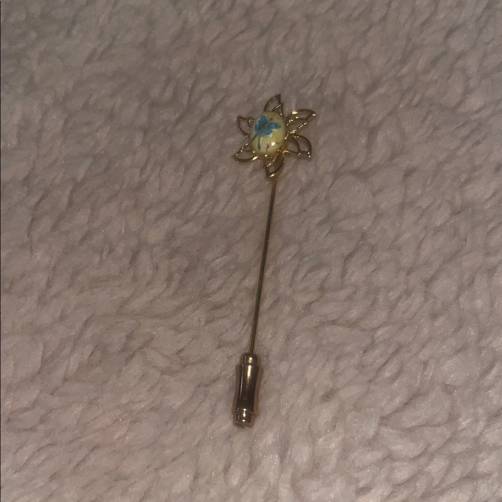 Antique flower stick  pin with white and blue stone